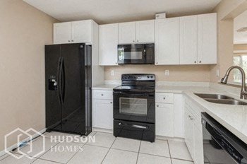 Hudson Homes Management Hudson Homes Management Single Family Home For Rent Pet Friendly 4732 NW 114th Ave 203 Doral FL 33178 3 bedrooms 2 bathrooms refrigerator dishwasher ceiling fans carpet bedrooms private balcony - Photo Gallery 2