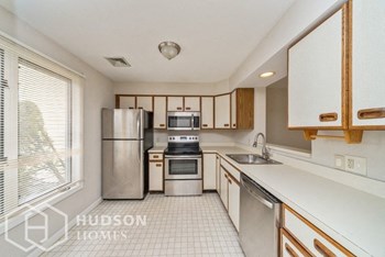 Hudson Homes Management Single Family Home For Rent Pet Friendly 535 S Street Unit 12 Fitchburg MA 01420 2 bedrooms 1.5 bathrooms carpet ceiling fans stainless steel appliances dishwasher refrigerator microwave fireplace back patio - Photo Gallery 2