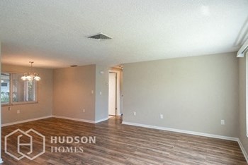 Hudson Homes Management Hudson Homes Management Single Family Home For Rent Pet Friendly 6301 Baldwyn Ave New Port Richey Florida 34653 attached garage dishwasher microwave back patio back yard 2 bathrooms - Photo Gallery 3