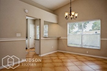 Hudson Homes Management Single Family Home For Rent Pet Friendly 11224 Bramblebrush St Tampa FL 33624 3 bedrooms 2 bathrooms carpet high ceilings stainless steel appliances ceiling fans dishwasher refrigerator microwave granite countertops attached garage - Photo Gallery 4