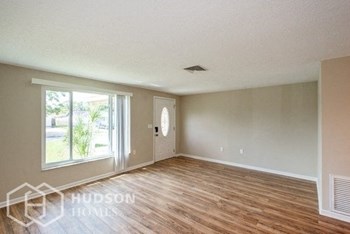 Hudson Homes Management Hudson Homes Management Single Family Home For Rent Pet Friendly 6301 Baldwyn Ave New Port Richey Florida 34653 attached garage dishwasher microwave back patio back yard 2 bathrooms - Photo Gallery 2