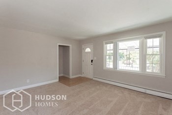 Hudson Homes Management Hudson Homes Management Single Family Home For Rent Pet Friendly 6402 Lehnert St Gwynn Oak MD 21207 4 bedrooms carpet back yard courtyard black appliances fireplace hardwood - Photo Gallery 5