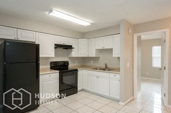 Hudson Homes Management Single Family Home For Rent Pet Friendly 1411 E 109th Ave Unit 1 Tampa FL 33612 3 bedrooms 1 bathroom granite countertops washer drier hookup refrigerator - Photo Gallery 4