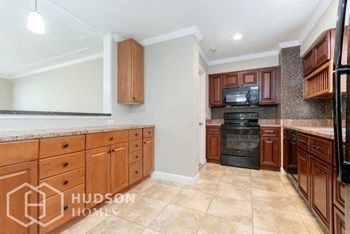 Hudson Homes Management Hudson Homes Management Single Family Home For Rent Pet Friendly 4850 Worth Ave Titusville Florida 32780 Attached Garage screened in patio dishwasher microwave - Photo Gallery 5
