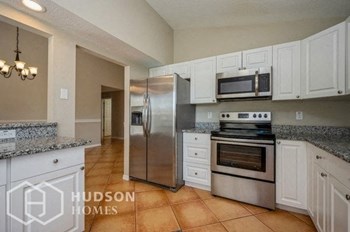 Hudson Homes Management Hudson Homes Management Single Family Home For Rent Pet Friendly 11224 Bramblebrush St Tampa FL 33624 3 bedrooms 2 bathrooms carpet high ceilings stainless steel appliances ceiling fans dishwasher refrigerator microwave granite countertops attached garage - Photo Gallery 6