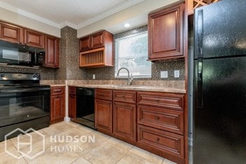 Hudson Homes Management Hudson Homes Management Single Family Home For Rent Pet Friendly 4850 Worth Ave Titusville Florida 32780 Attached Garage screened in patio dishwasher microwave - Photo Gallery 6