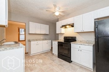 Hudson Homes Management Hudson Homes Management Single Family Home For Rent Pet Friendly 207 Mill St Lodi OH 44254 3 bedrooms 1 bathroom half bath carpet wooden accents ceiling fan basement back yard patio front porch - Photo Gallery 5