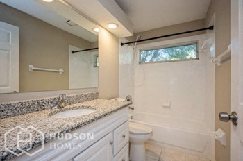 Hudson Homes Management Single Family Home For Rent Pet Friendly 11224 Bramblebrush St Tampa FL 33624 3 bedrooms 2 bathrooms carpet high ceilings stainless steel appliances ceiling fans dishwasher refrigerator microwave granite countertops attached garage - Photo Gallery 8