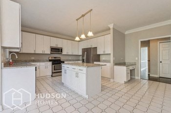 Hudson Homes Management Single Family Home For Rent Pet Friendly remodeled kitchen remodeled bathroom beautiful lawn spacious vaulted ceiling island kitchen granite patio ceramic tile  2117 FARGO BOULEVARD GENEVA Illinois 60134 - Photo Gallery 8