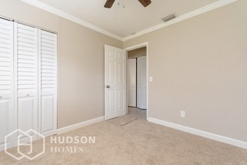 Hudson Homes Management Single Family Home For Rent Pet Friendly 4850 Worth Ave Titusville Florida 32780 Attached Garage screened in patio dishwasher microwave - Photo Gallery 10