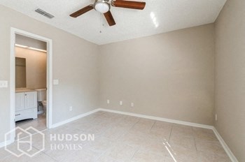 Hudson Homes Management Single Family Home For Rent Pet Friendly 6115 Oak Cluster Circle Tampa FL 33634 2 bedrooms 2.5 bathrooms ceiling fans refrigerator laundry room attached garage screened porch fenced yard - Photo Gallery 9