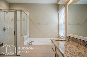 Hudson Homes Management Single Family Home For Rent Pet Friendly 11224 Bramblebrush St Tampa FL 33624 3 bedrooms 2 bathrooms carpet high ceilings stainless steel appliances ceiling fans dishwasher refrigerator microwave granite countertops attached garage - Photo Gallery 11