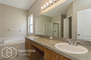 Hudson Homes Management Single Family Home For Rent Pet Friendly 11431 Villagebrook Dr Riverview FL 33569 4 bedrooms 2 bathrooms carpet dishwasher refrigerator microwave laundry room two car garage screened back porch ceiling fans - Photo Gallery 7