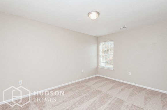 the spacious living room is clean and ready for you to use