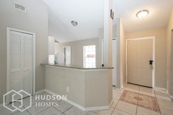 Hudson Homes Management Single Family Home For Rent Pet Friendly 404 Hope Circle Orlando Florida 32811 attached garage vaulted ceilings 4 bedroom back yard dishwasher - Photo Gallery 6