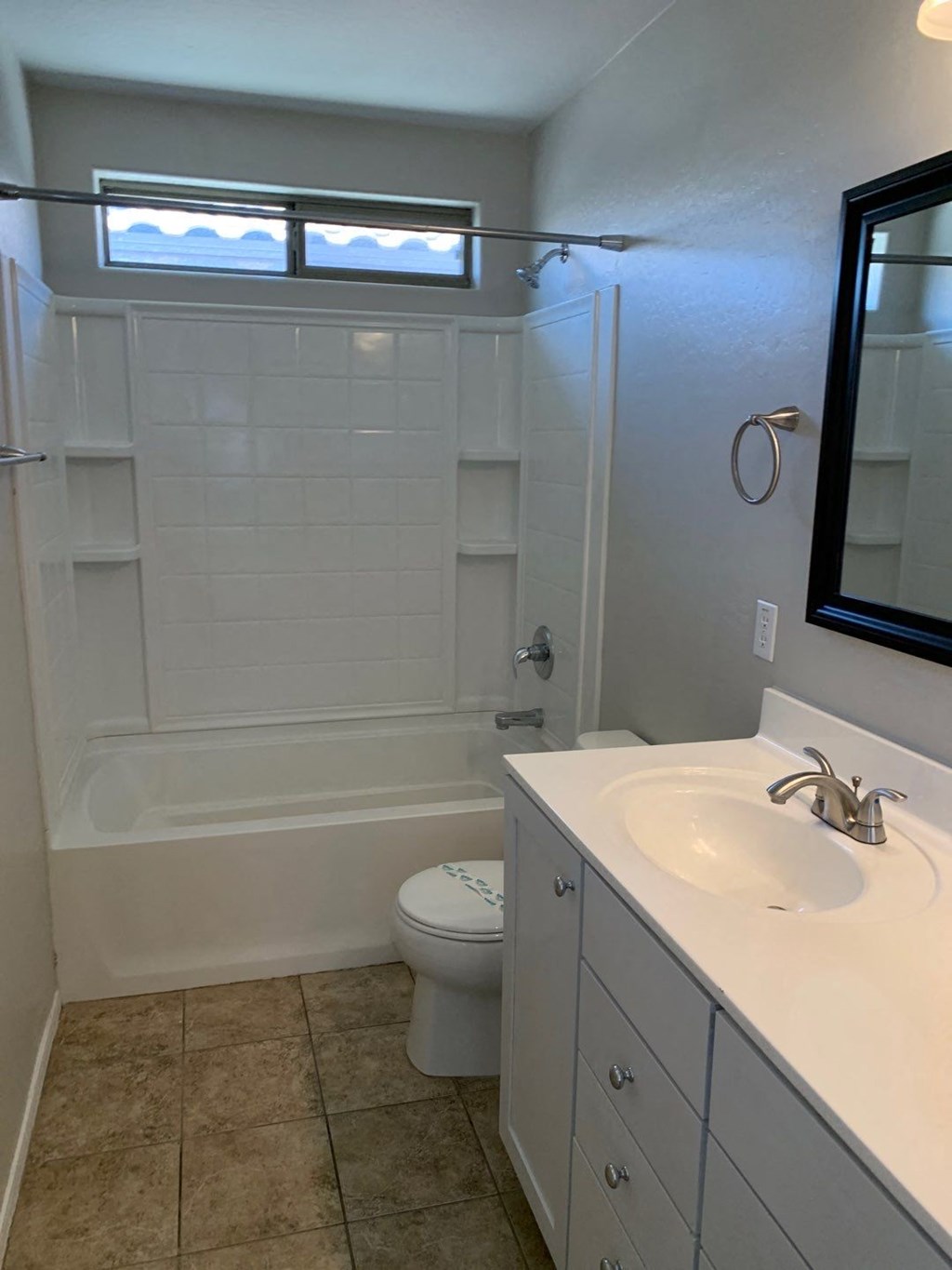 a bathroom with a sink toilet and a bath tub