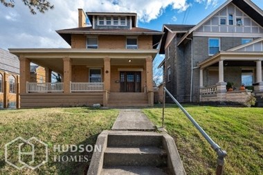 Hudson Homes Management Single Family Home For Rent Pet Friendly 4344 Floral Ave Cincinnati OH 45212 4 bedrooms 1 bathroom hardwood carpet refrigerator microwave dishwasher porch two story ceiling fan back yard lawn family room