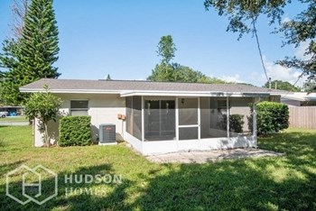 Hudson Homes Management Single Family Home For Rent Pet Friendly 4850 Worth Ave Titusville Florida 32780 Attached Garage screened in patio dishwasher microwave - Photo Gallery 13
