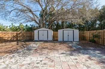Hudson Homes Management Single Family Home For Rent Pet Friendly 6115 Oak Cluster Circle Tampa FL 33634 2 bedrooms 2.5 bathrooms ceiling fans refrigerator laundry room attached garage screened porch fenced yard - Photo Gallery 15
