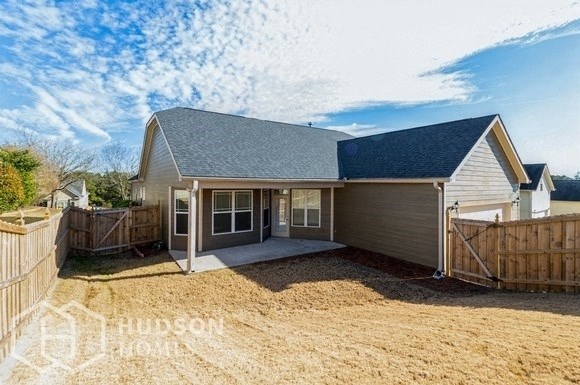 Hudson Homes Management Single Family Home For Rent Pet Friendly remodeled kitchen remodeled bathroom beautiful large lawn washer dryer connection black appliances high ceilings 2961 Nairn Court Douglasville GA	30135