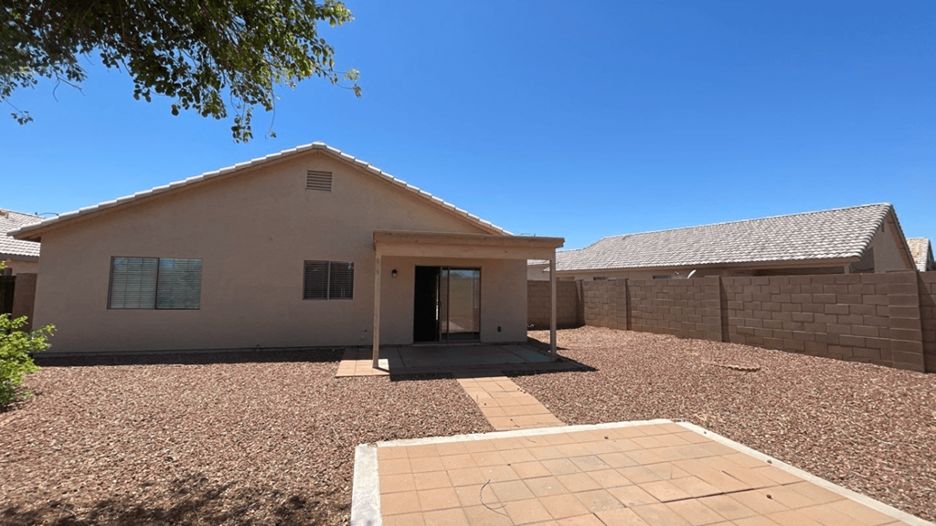 a new house with a driveway and a garage door