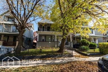 Hudson Homes Management Single Family Home For Rent Pet Friendly 1405 E 95th St Unit 1 Cleveland OH 44106 2 bedrooms 1 bathroom basement ceiling fan attic porch refrigerator