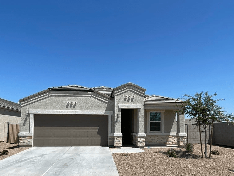 a house with a driveway and a garage door