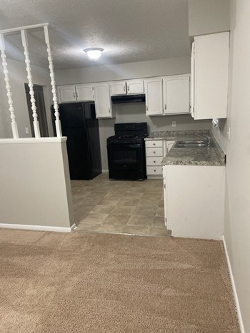 Hudson Homes Management Single Family Home For Rent Pet Friendly 6 Bronson St Berea OH 44017 4 bedrooms 2 bathrooms basement fireplace, refrigerator dishwasher back yard deck attached garage ceiling fan - Photo Gallery 3