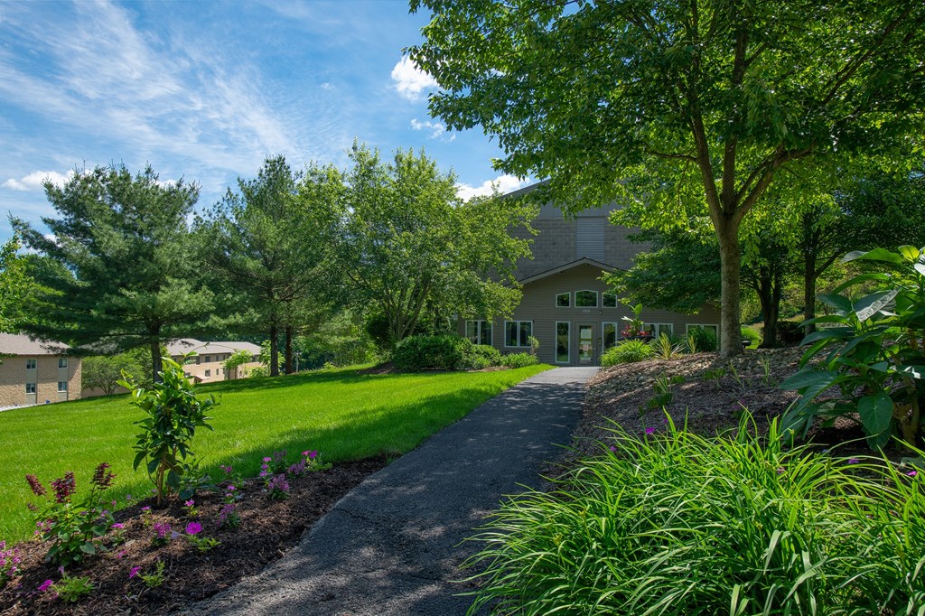 a house on a hill with a driveway leading up to it at North Pointe Commons, Pittsburgh, PA