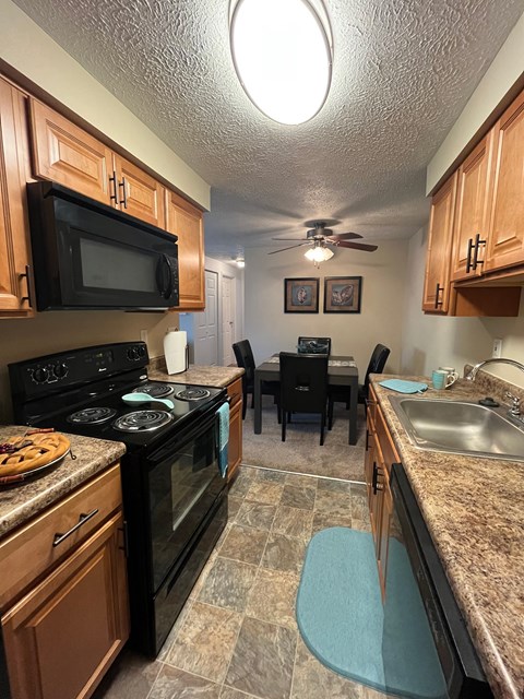 Fully Equipped Kitchen and Dining Area at Deauville Park Apartments, Monroeville, PA, 15146