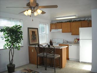 Kitchen with Island  at Pacific Highlands Apartments, Natrona Heights, PA