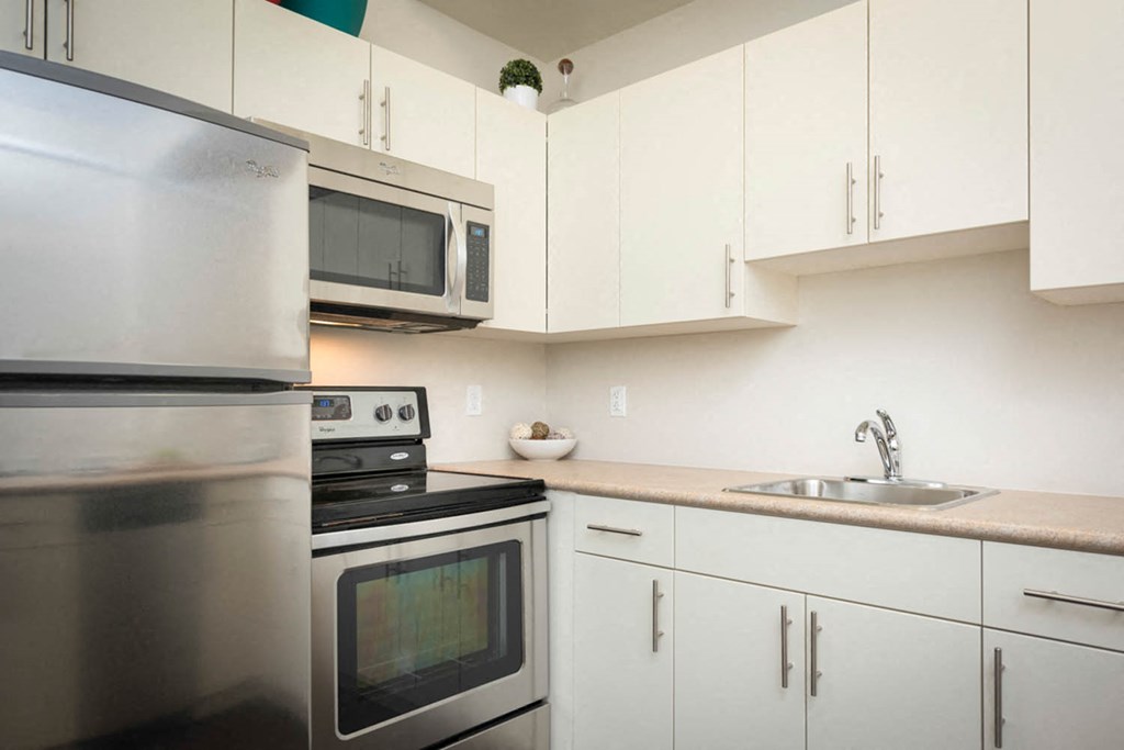 Kitchen and Dining Area at 300 Tache Apartment, Winnipeg, MB.