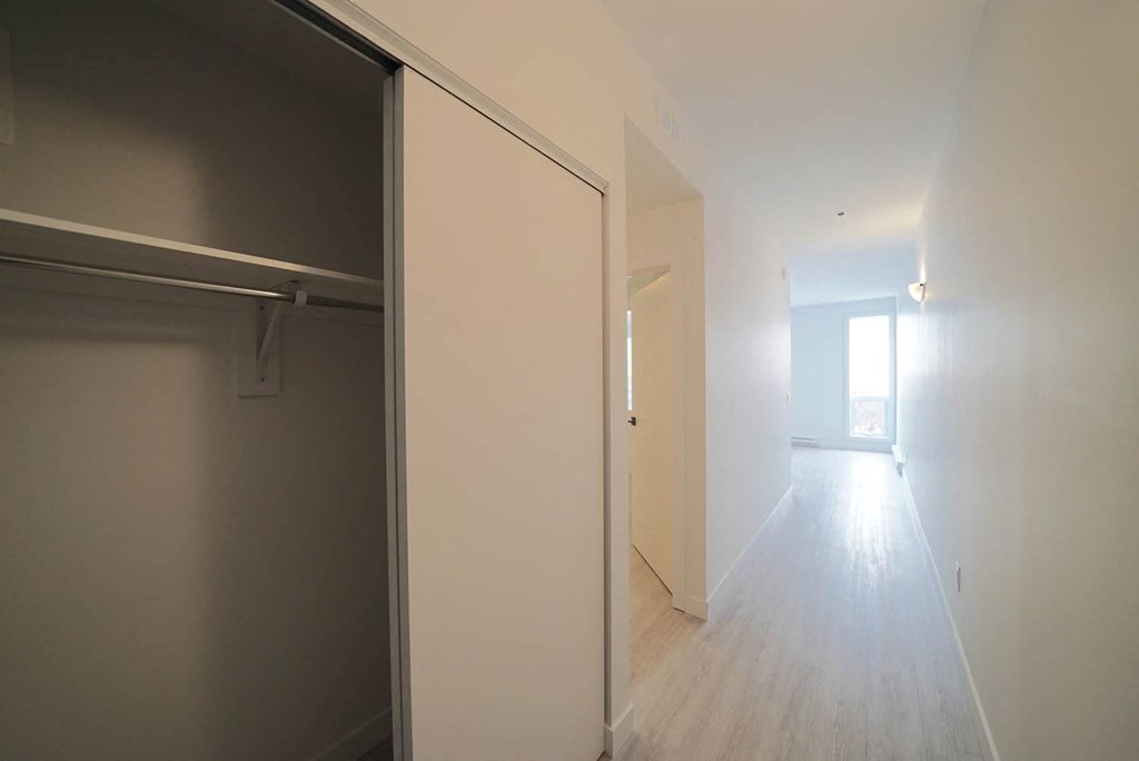 Hallway with Closet Storage at 703 St. Anne's Road Apartments, Winnipeg, MB