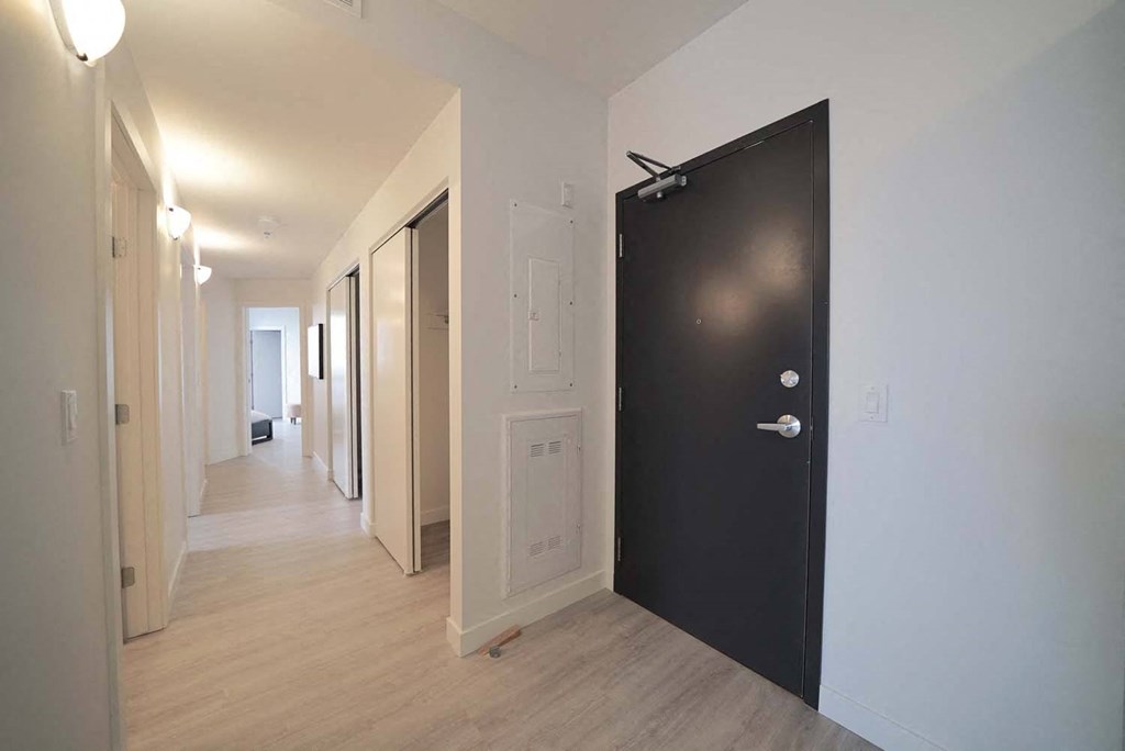 Hallway with Closet Storage at 703 St. Anne's Road Apartments, Winnipeg, MB