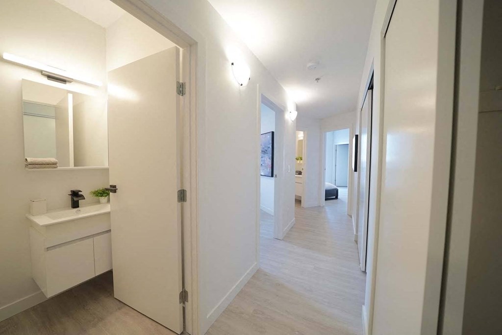 Hallway with Closet Storage at 703 St. Anne's Road Apartments, Winnipeg, MB