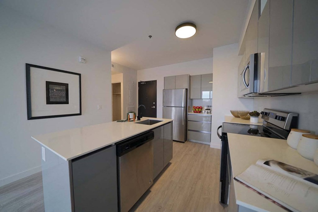 Kitchen With Modern Finishings at 703 St. Anne's Road Apartments, Winnipeg,MB
