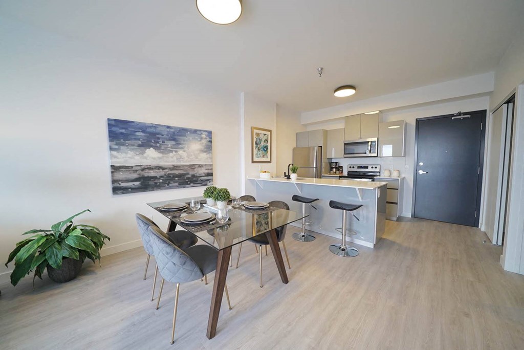 Modern Kitchen With Dining Area at 703 St. Anne's Road Apartments, Winnipeg,MB