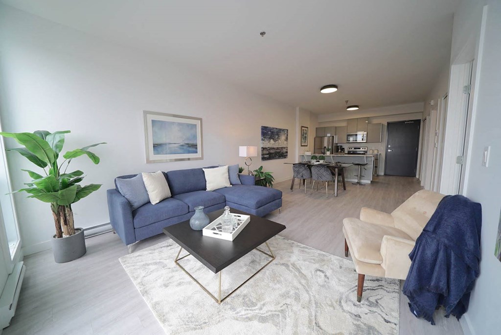 Spacious Living Area with Kitchen at 703 St. Anne's Road Apartments, Winnipeg, MB