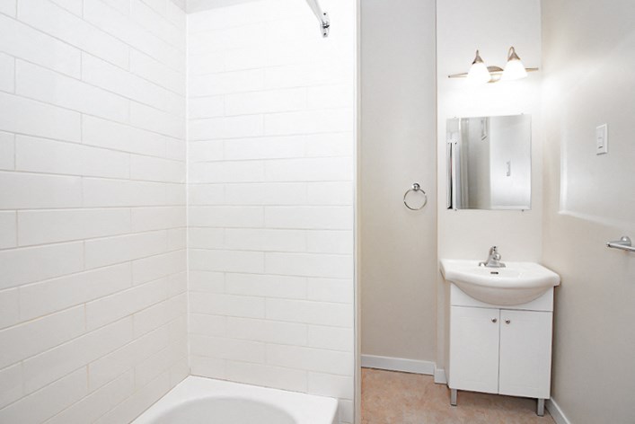 A Renovated Bathroom at 883 Grosvenor Apartments for rent in Winnipeg