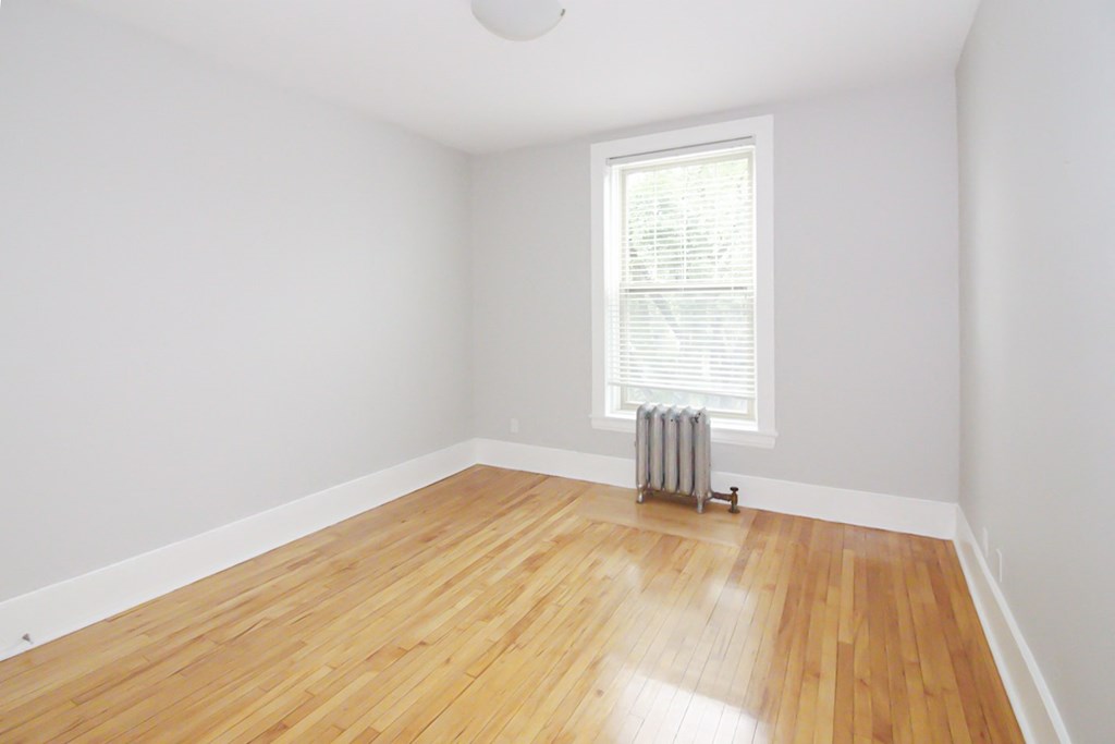 Bedroom at 105 Clarke Apartment Suites