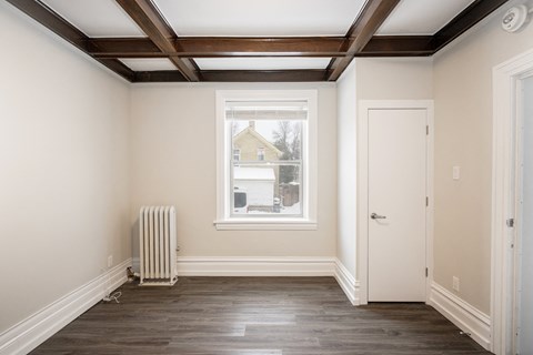 A bedroom at 117 Bryce Suites for rent in Winnipeg