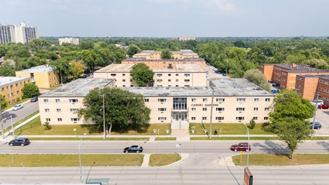 A large building with the words "Campbell Gardens" on the front.