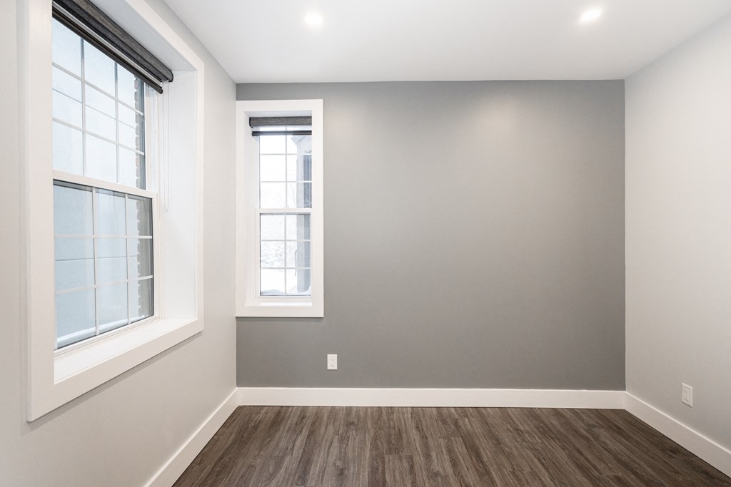 A bedroom at a two-bedroom suite for rent in Winnipeg