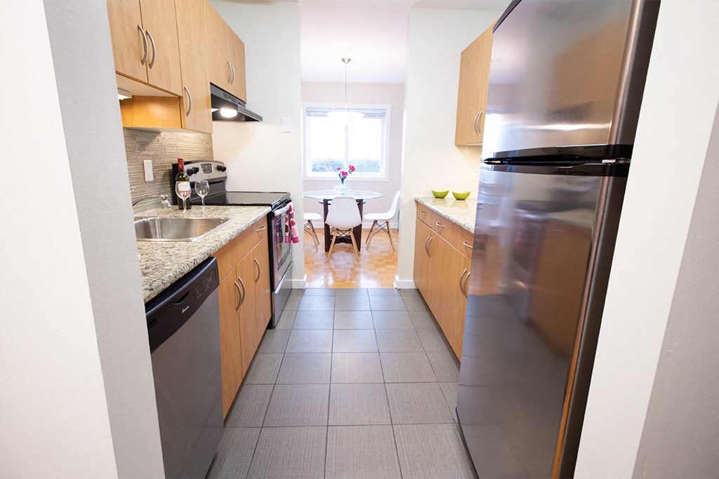 Efficient Appliances In Kitchen at 1310 Archibald Apartments, Winnipeg, MB R2J 0Z4