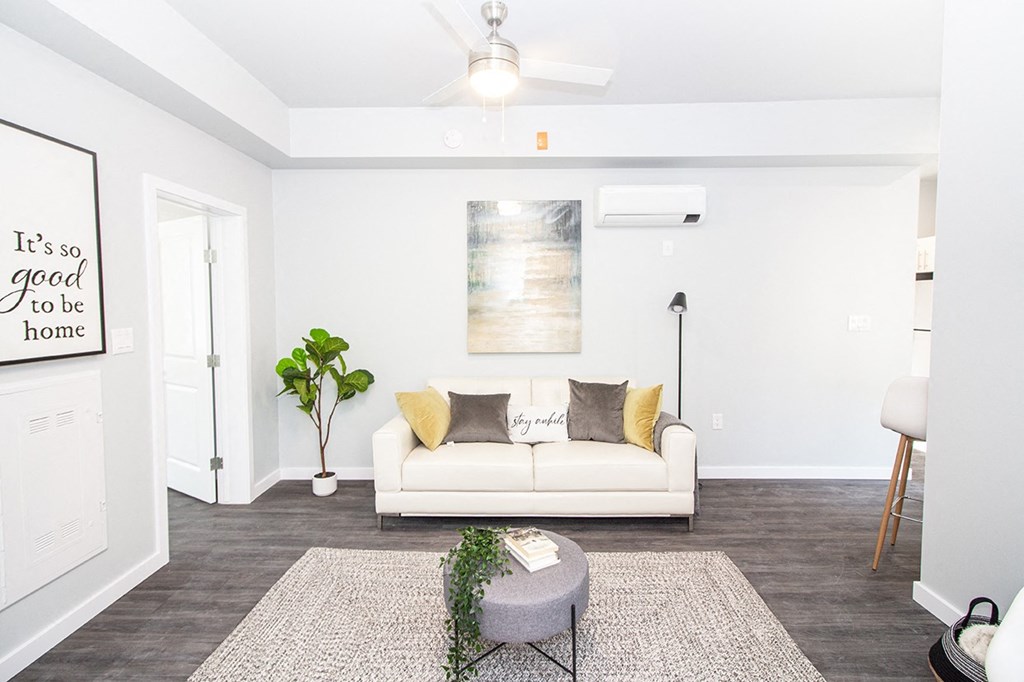 Rent in Winnipeg: a living room with white walls and a white couch