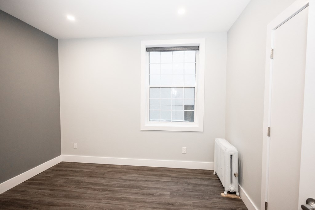 A bedroom at a two-bedroom suite for rent in Winnipeg