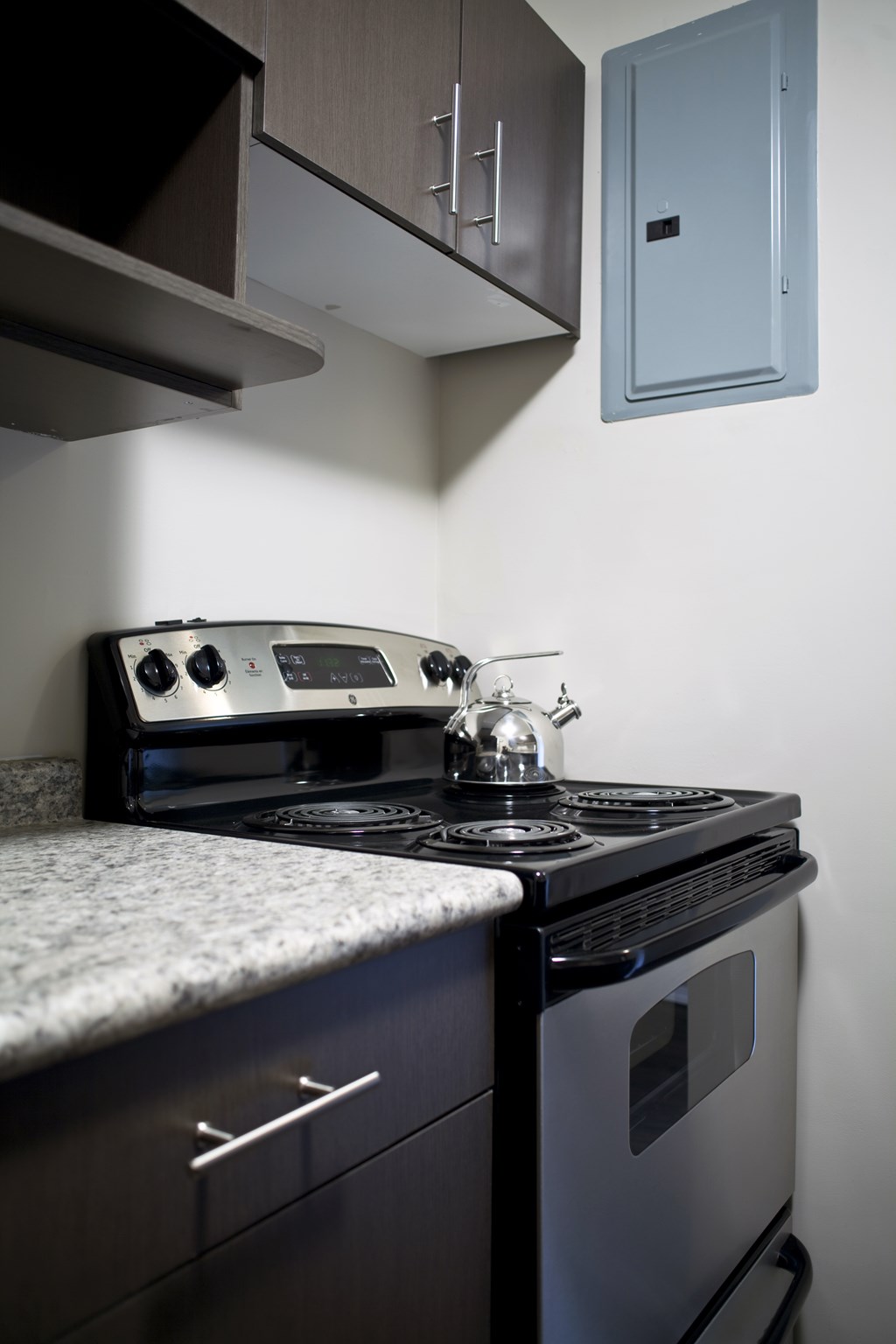A modern kitchen with a stove and oven.