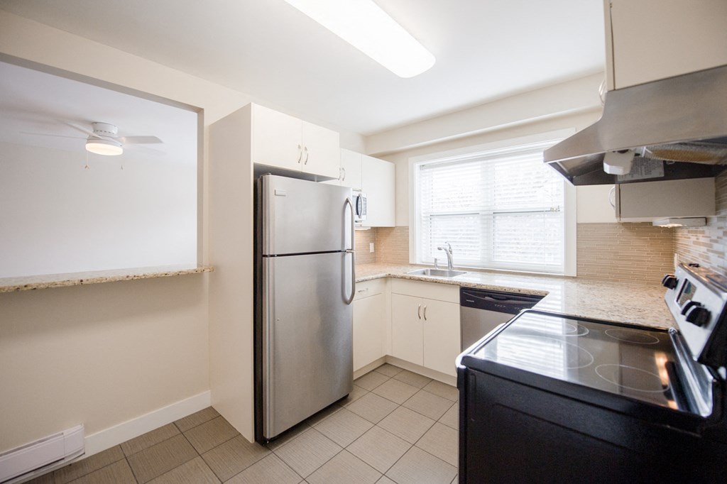Kitchen With Stainless Steel Appliances 700 Corydon Apartment, Apartments for Rent in Winnipeg