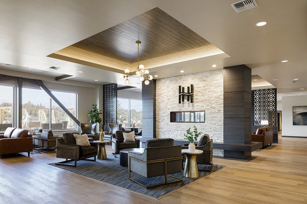 Fireplace Lounge with vaulted ceiling at Harbor Heights 55+ Community, Washington, 98501