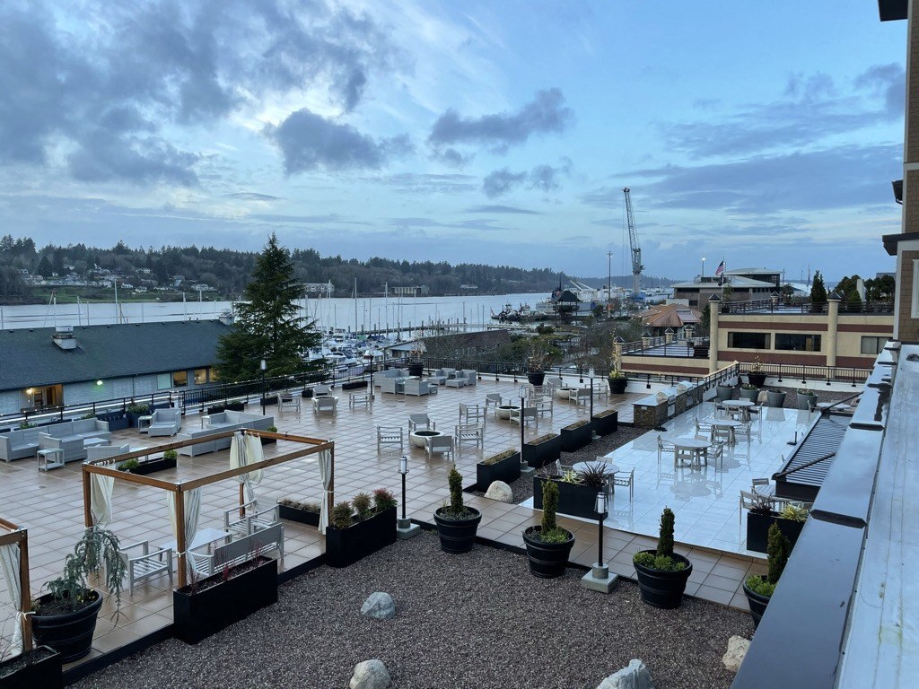 Exterior patio with water views at Harbor Heights 55+ Community, Olympia, Washington